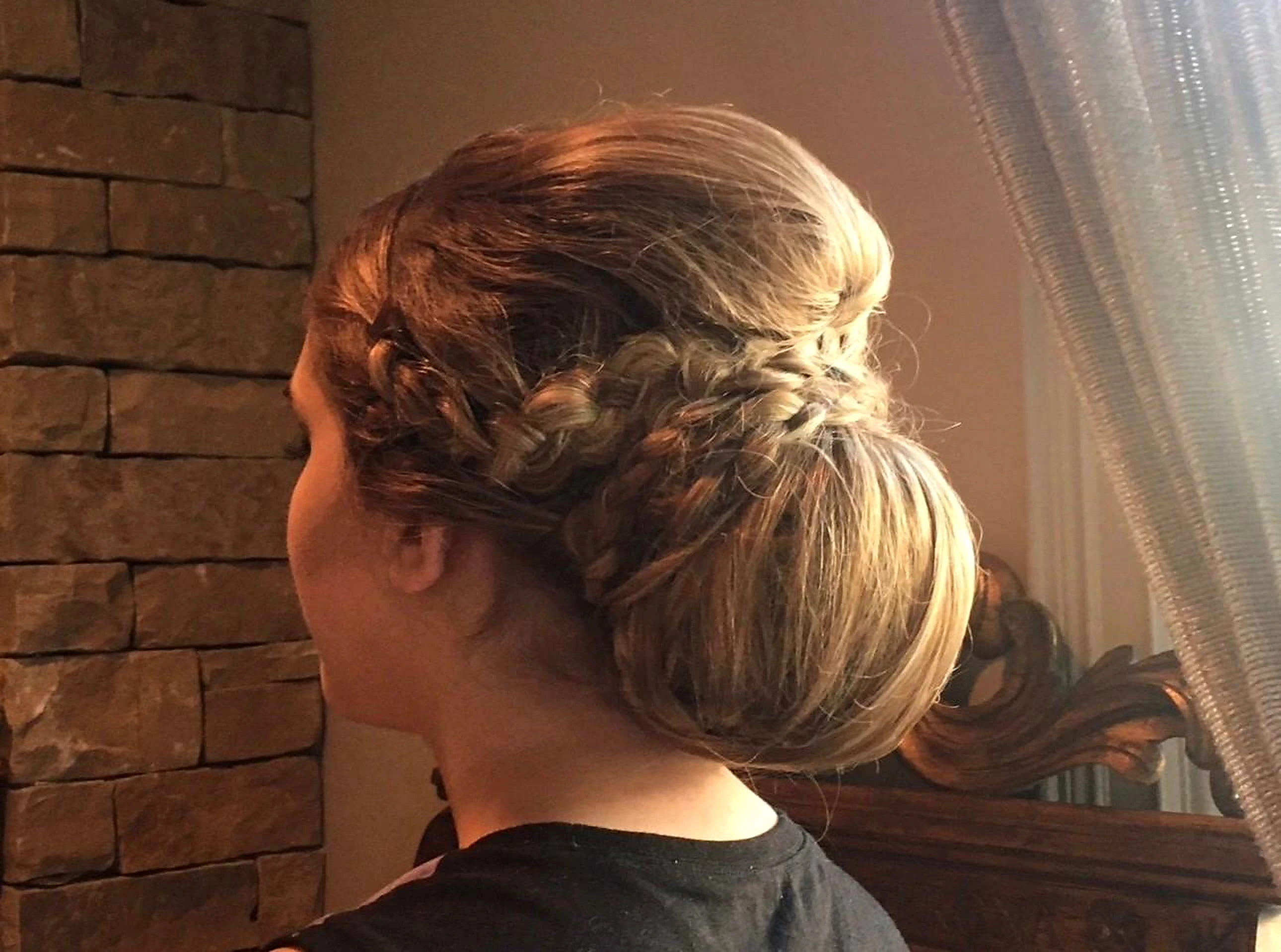 Detailed braided special-event updo created by Elizabeth